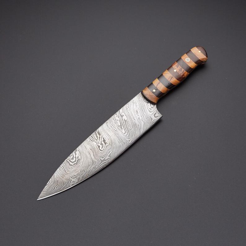 Handcrafted knife with a striking Damascus steel blade